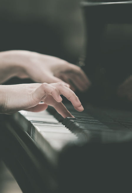 Hands girl playing piano